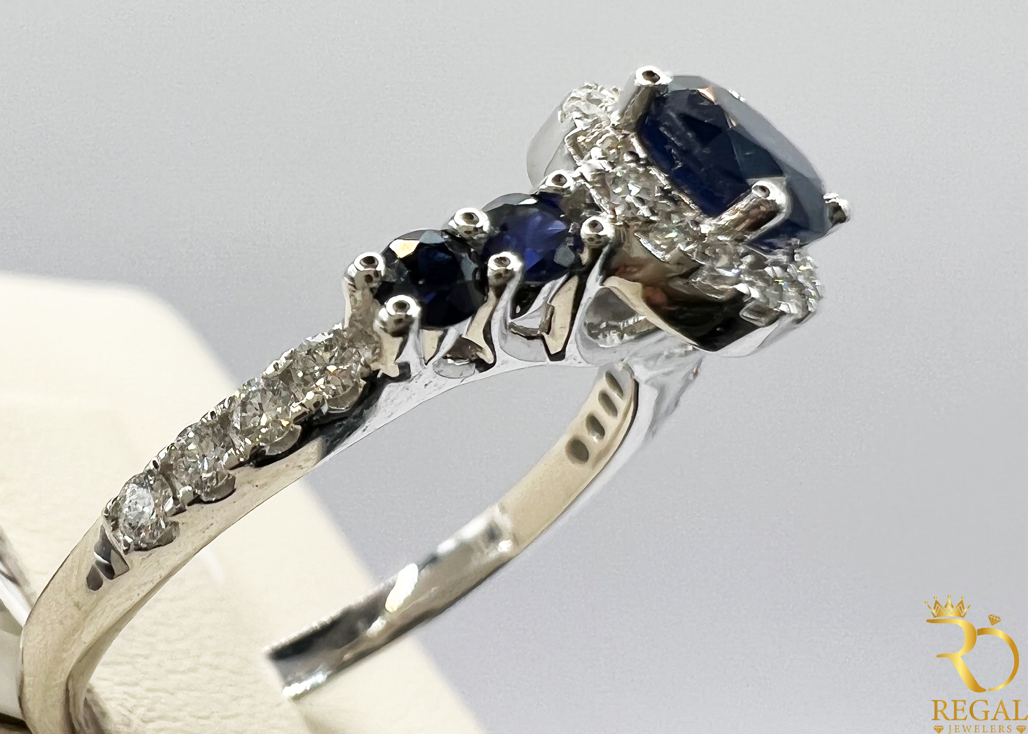 Engagement Ring With Blue Sapphire Stone & Diamonds